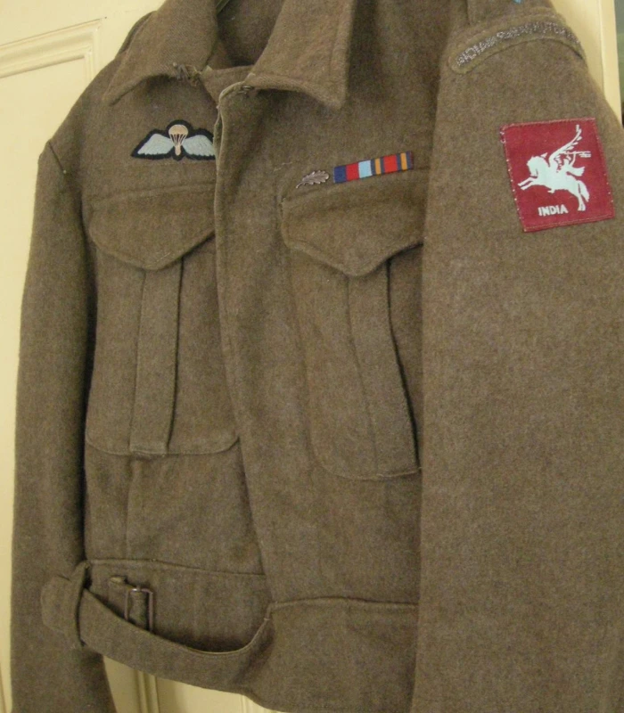 Close-up of olive military utility shirt with pockets