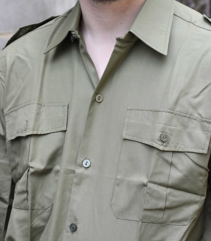 Vintage military woolen field jacket with patches.